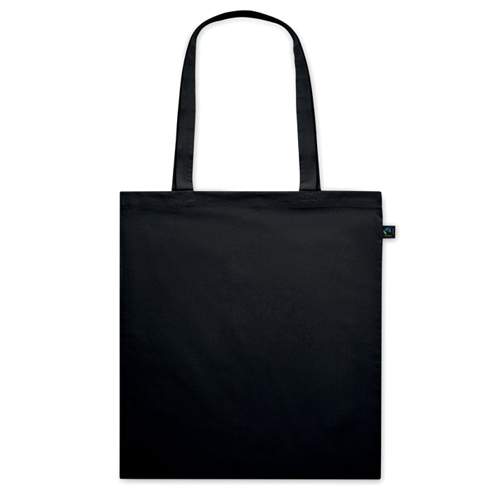 Bolsa de algodón OSOLE COLOUR negra con etiqueta de comercio justo, asas largas y diseño ecológico. Ideal para ferias y regalos corporativos.