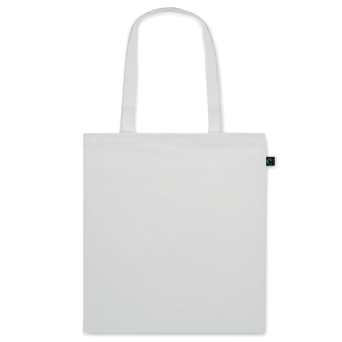 Bolsa de tela blanca OSOLE COLOUR con etiqueta de comercio justo y asas largas. Ideal para ferias, tiendas ecológicas y promociones.