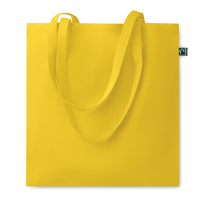 OSOLE COLOUR - Bolsa de algodón de comercio justo con asas largas en color amarillo, perfecta para ferias y promociones sostenibles.