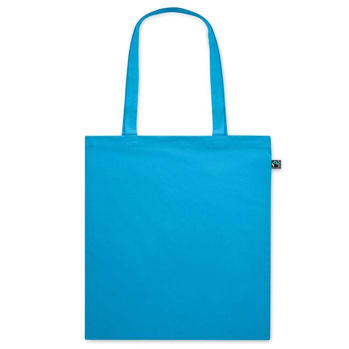 Bolsa azul celeste OSOLE COLOUR de algodón 140gr/m² con asas largas, ecológica y personalizable. Perfecta para eventos promocionales.