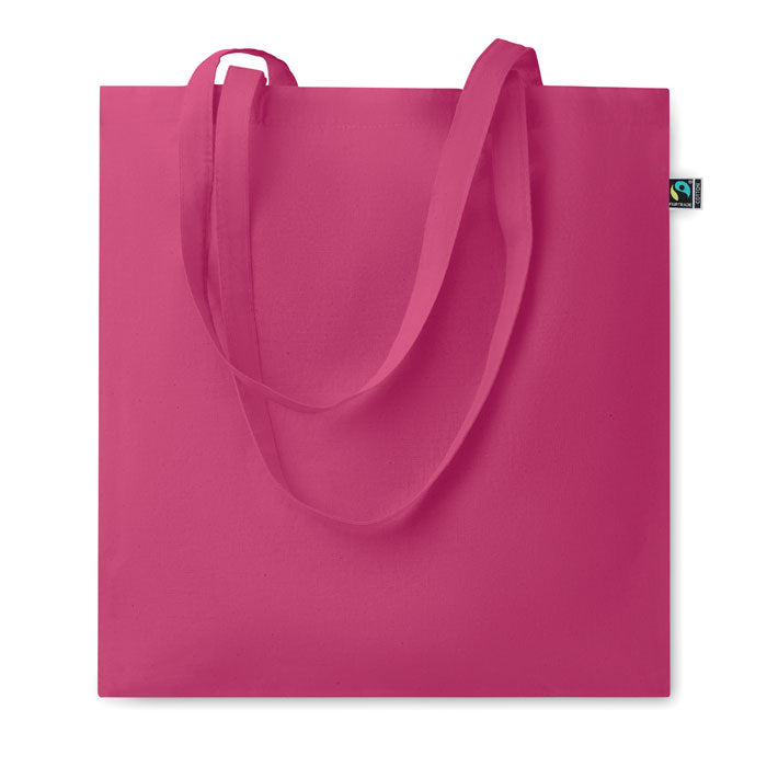OSOLE COLOUR - Bolsa de algodón de comercio justo con asas largas en color fucsia, ideal para ferias, tiendas y regalos promocionales.
