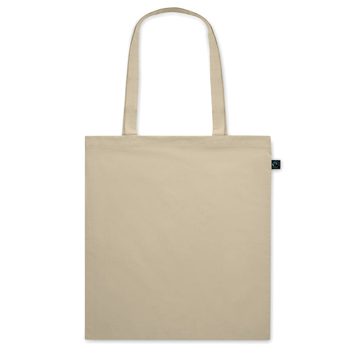 Bolsa OSOLE COLOUR beige claro de algodón de comercio justo con asas largas, perfecta para ferias, tiendas y regalos sostenibles.
