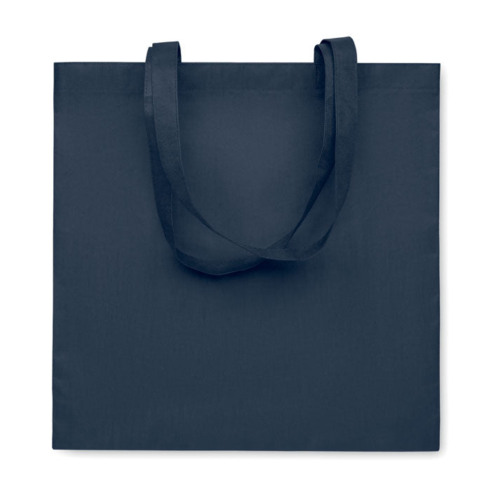 KAIMANI - Bolsa non woven RPET 80 gr/m2 asas largas en azul marino, reutilizable y personalizable para promociones sostenibles.