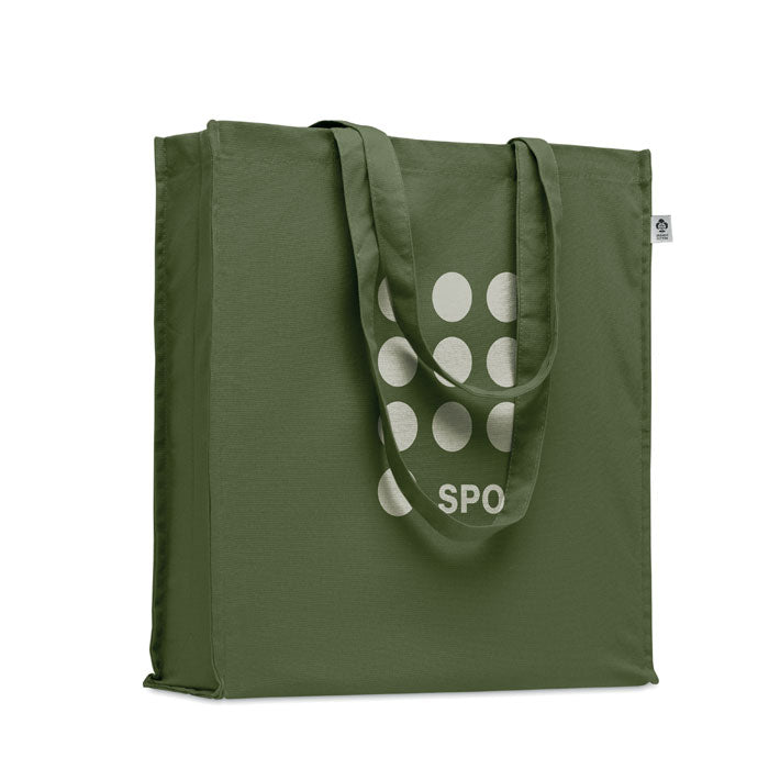 Bolsa verde oliva BENTE COLOUR personalizada con diseño de puntos, ideal como bolsa de tela promocional y reutilizable.