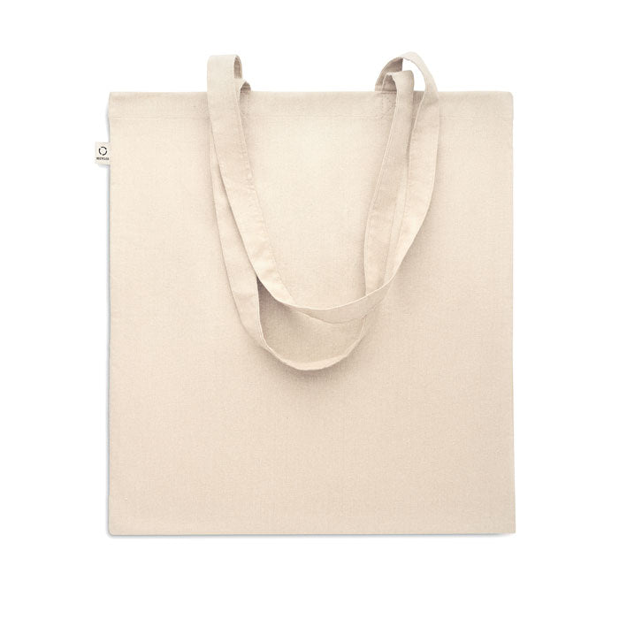 Tote bag VIVEKA fabricada con 70% algodón reciclado y 30% RPET, diseño ecológico y funcional para compras sostenibles o eventos corporativos.