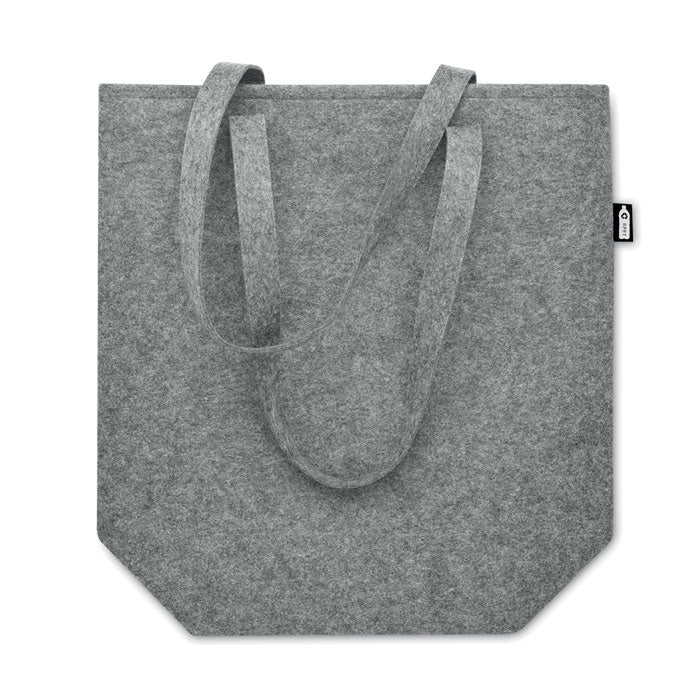 Vista trasera de la bolsa de compra TASLO de fieltro RPET gris claro, con base reforzada y asas largas para mayor comodidad.