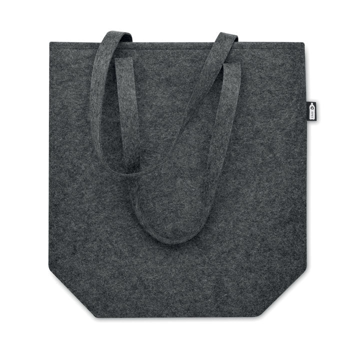 Vista trasera de la bolsa de compra TASLO en fieltro RPET gris oscuro, con base ancha y asas largas para mayor capacidad y confort.