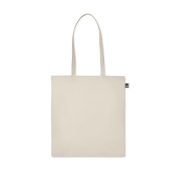 Bolsa ZIMDE de algodón orgánico con asas largas, diseño minimalista y ecológico, perfecta para el uso diario y compras.