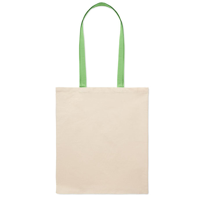 Vista trasera de la bolsa ZEVRA con asas largas verdes. Diseño simple y funcional para la categoría de Tote Bags.