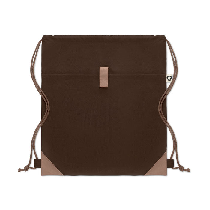 Vista trasera de la PANDA BAG marrón oscuro con bolsillo exterior y refuerzos, perfecta para personalización y uso ecológico.