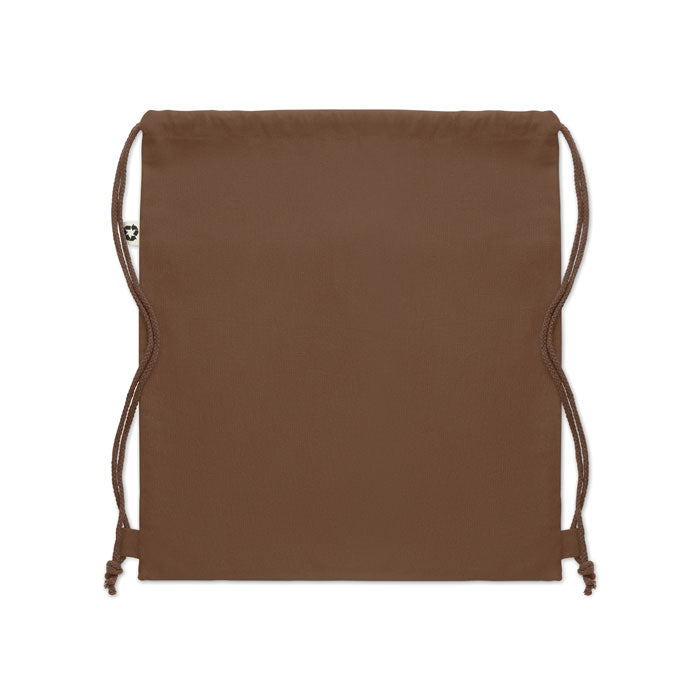 Parte trasera de la PANDA BAG marrón claro, bolsa de tela reciclada con diseño minimalista y funcional para uso diario.