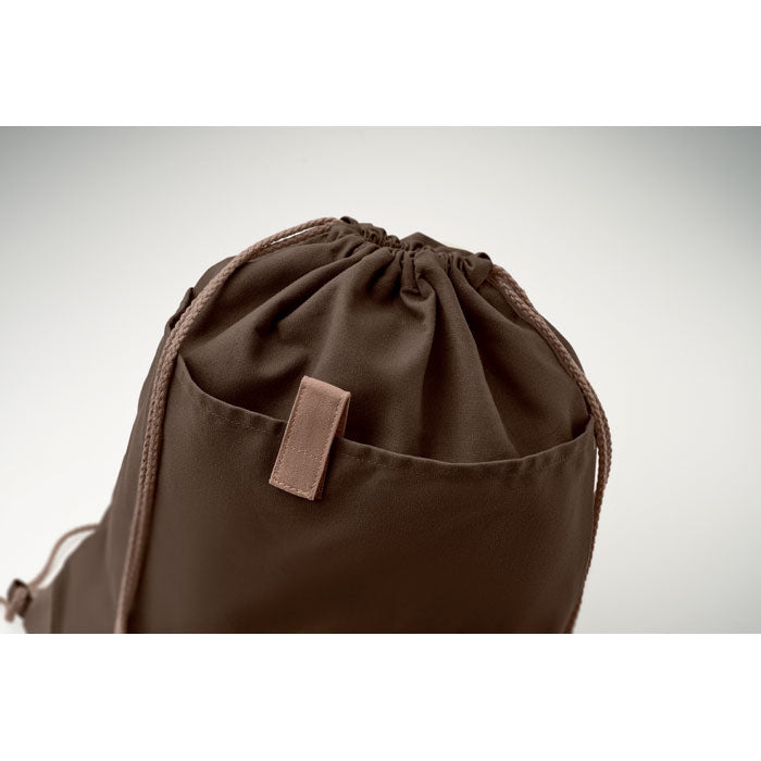 Detalle del cierre de la PANDA BAG marrón claro, muestra la calidad del algodón reciclado y el diseño ecológico.