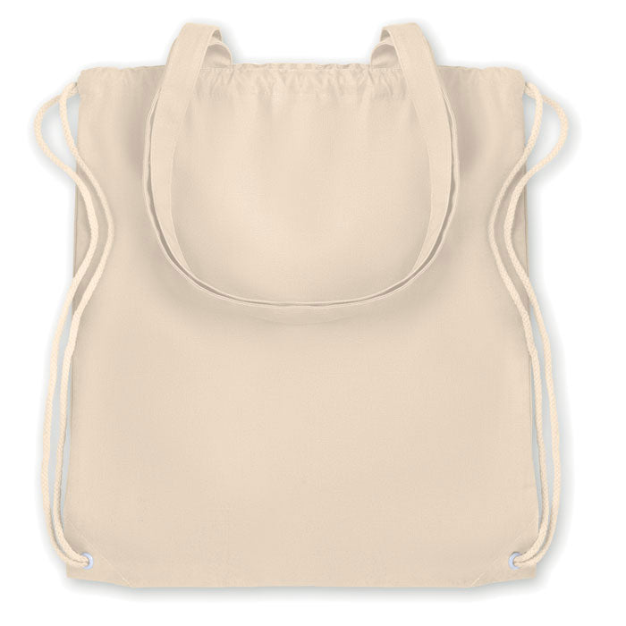 Vista trasera de la mochila MOIRA en canvas beige con asas largas y cierre de cuerdas, perfecta para campañas promocionales y uso urbano.
