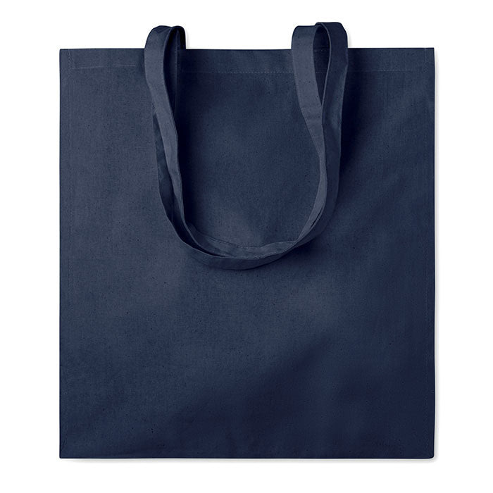 Bolsa de algodón de color azul marino con asas largas y superficie lisa, vista frontal.