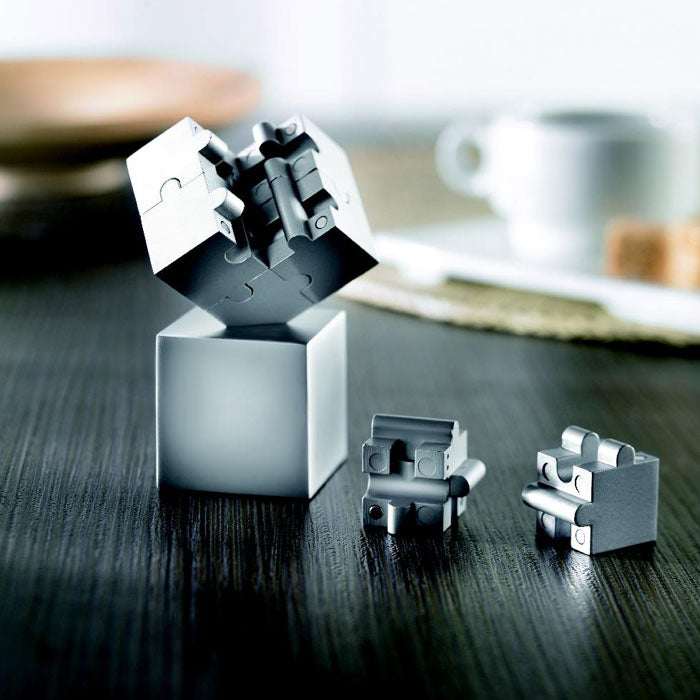 KUBZLE - Puzzle 3D metálico y magnético - Regalos Corporativos Personalizados · Clap Comunicacion