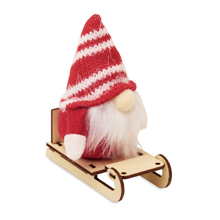 FROSTY SLEIGH - Gnomo en trineo de madera decorativo con gorro a rayas y detalles en fieltro.