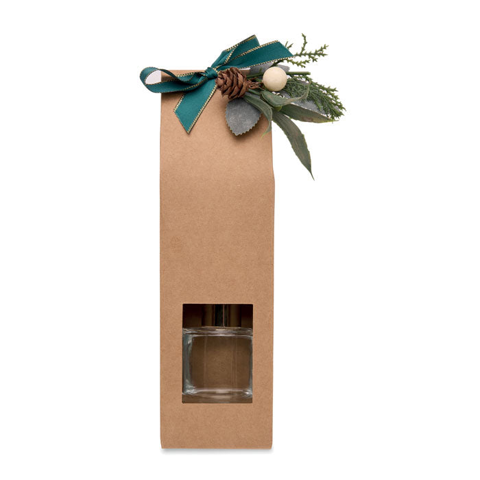 GINGLE - Set vela y difusor de vainilla en caja kraft decorada con cintas y elementos naturales.