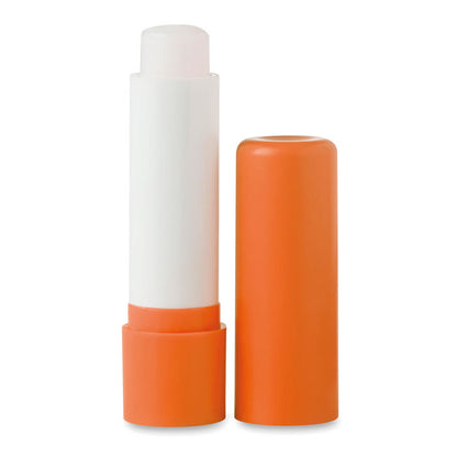 Barra de bálsamo labial naranja abierta con tapa al lado