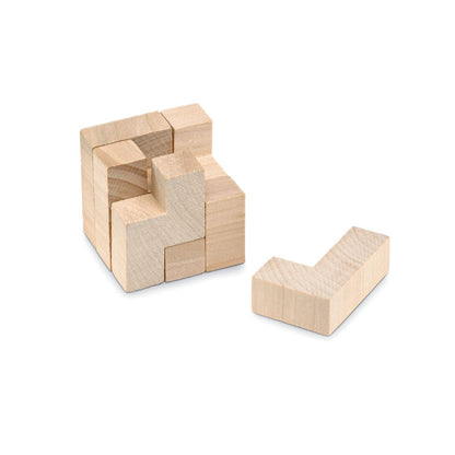 Puzzle cubo 3d de madera con una pieza aparte