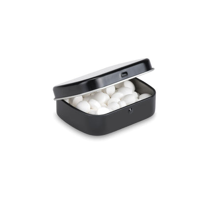 Caja abierta negra con caramelos de menta