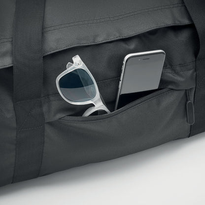 Bolsillo frontal con cremallera de bolsa de deporte negra para objetos como gafas de sol y móvil