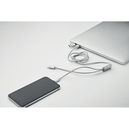 Móvil cargando con cable y portátil