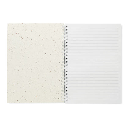 Interior de libreta con espiral de hojas blancas de papel reciclado y tapas de papel de semillas