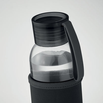 Parte superior de botella de vidrio con tapa negra