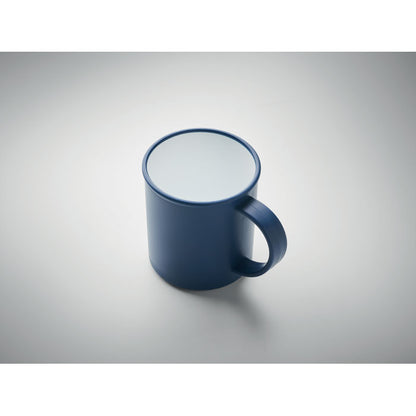 Vista superior de mug vintage azul marino con interior blanco