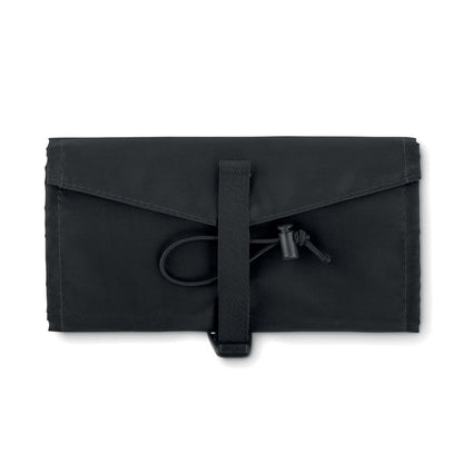 Vista trasera de bolsa organizadora negra plegada con detalle del cierre