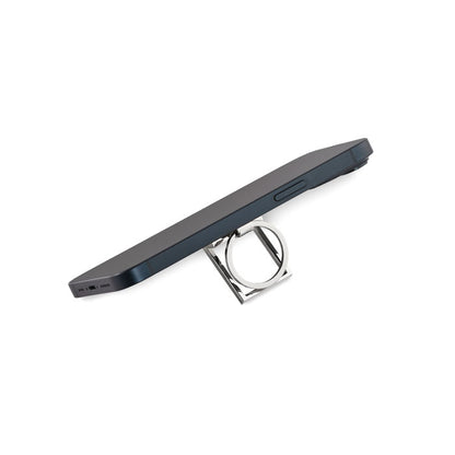 Teléfono móvil sobre soporte metálico