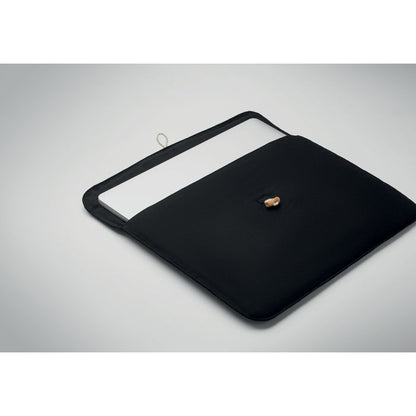 Funda portátil vista por encima negra con portátil