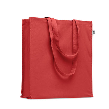 Bolsa roja de la compra de algodón orgánico con asas largas y fuelle.