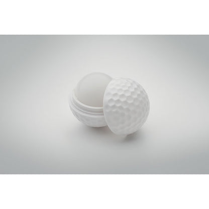 Bálsamo labial pelota de golf blanca abierto con fondo gris