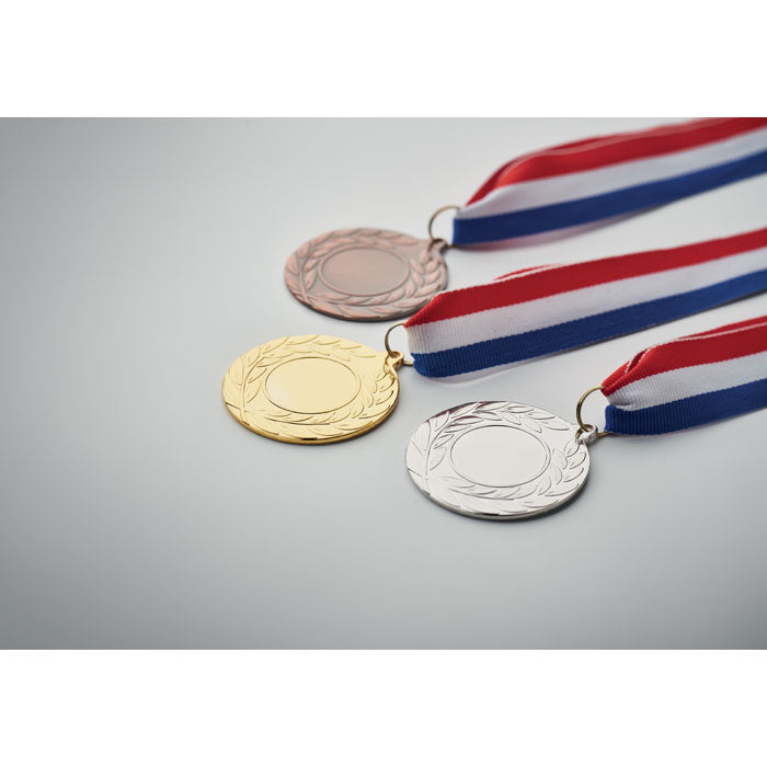 WINNER - Medalla de hierro con cinta - Regalos Corporativos Personalizados · Clap Comunicacion