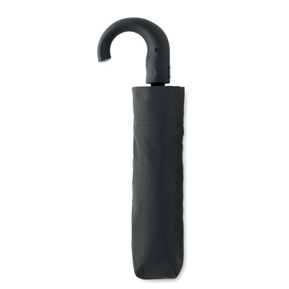 Paraguas negro plegado dentro de funda 