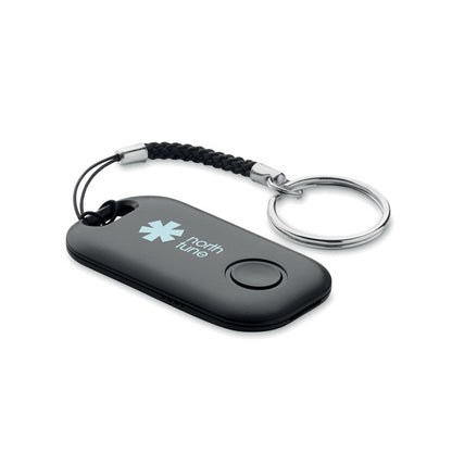 Gadget localizador plano y ligero, con superficie negro mate y estructura sólida.
