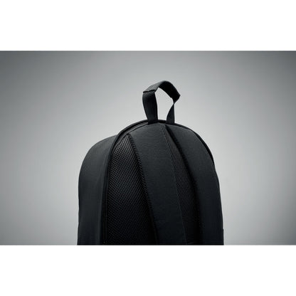 Parte trasera superior de mochila negra con asa de mano para transporte