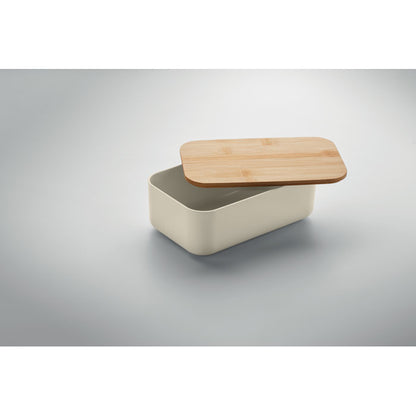 Fiambrera beige con tapadera de madera medio abierta