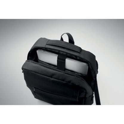 Vista superior de mochila abierta con portátil