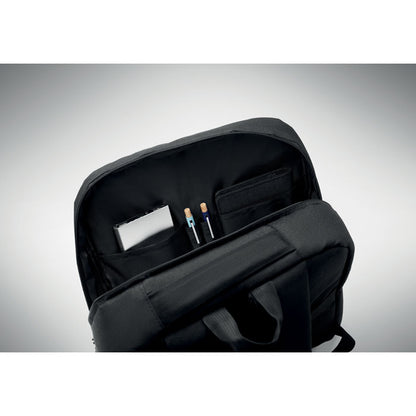 Parte superior de mochila abierta con 2 bolígrafos dentro