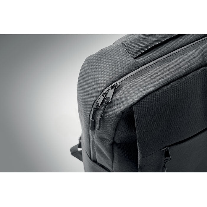 AKRAOS - Mochila para portátil de 15" mostrando el cierre de cremallera y el material resistente.