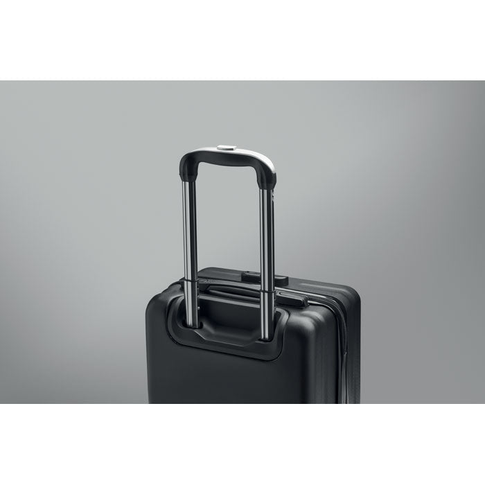 Asa telescópica de maleta trolley ABS en color negro, fabricada con acabado metálico y diseño ergonómico.