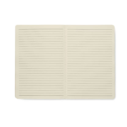 Libreta abierta con hojas color crema con rayas