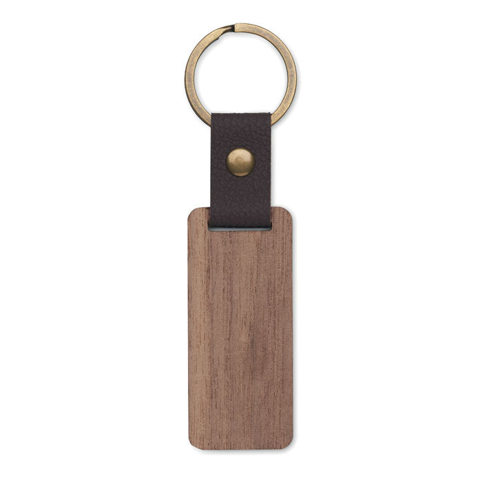 Llavero rectangular de madera de nogal oscura con detalle de polipiel marron y aro metálico dorado