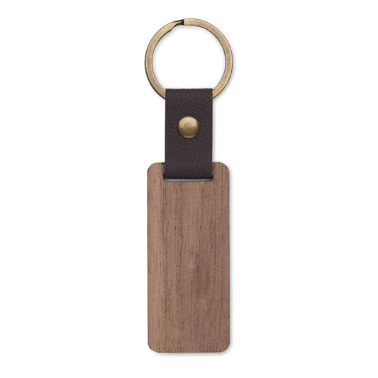 Llavero rectangular de madera de nogal oscura con detalle de polipiel marron y aro metálico dorado