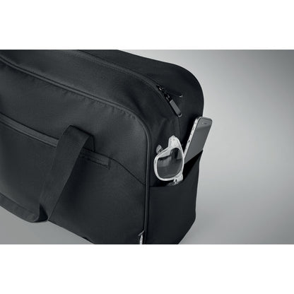 Paraguas plegable dentro de bolsillo lateral de maleta de mano