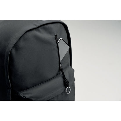 Movil en bolsillo de mochila negra de portátil