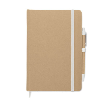 Vista superior de libreta de cartón con goma blanca y marcapáginas
