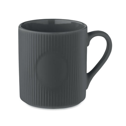 Taza con textura de líneas verticales con zona lisa para marcaje color negro mate